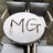 MG